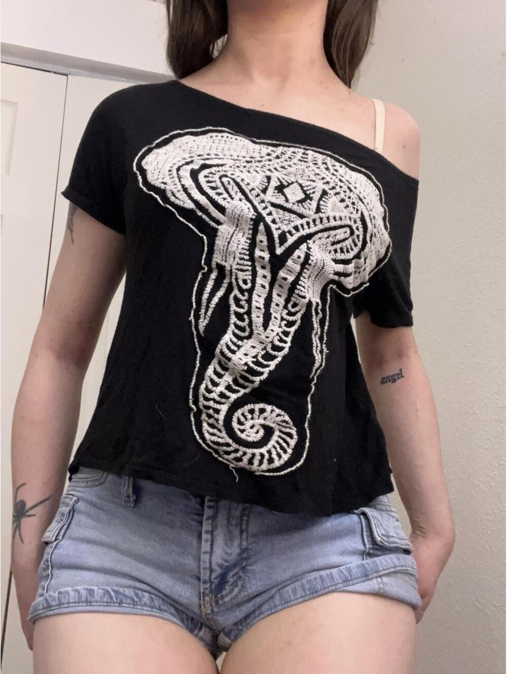 Black off the shoulder top with elephant